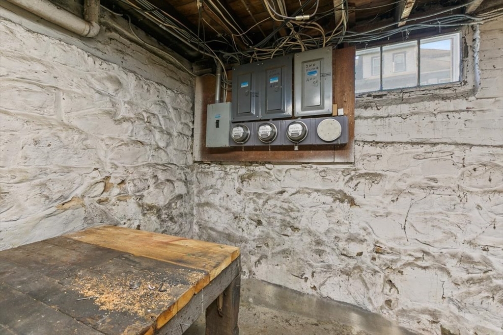 98 Webster Street Haverhill, MA 01830 - Photo 41 of 42 a view of a fireplace door