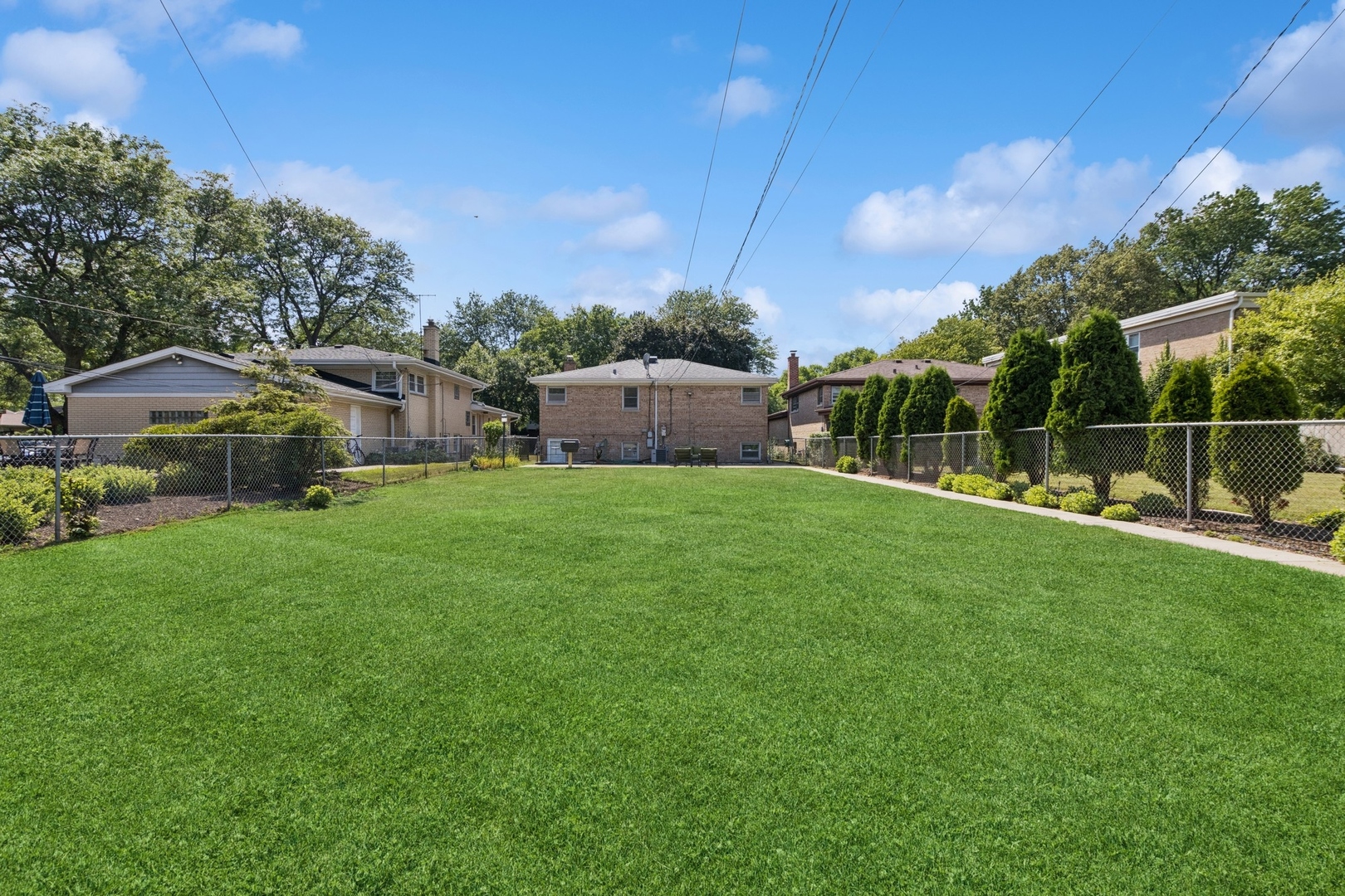 9007 Forestview Road Evanston, IL 60203 - Photo 25 of 29 a view of a house with a big yard