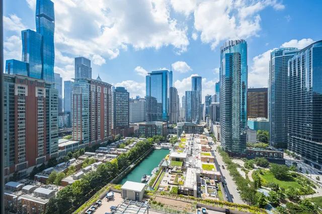 a view of a city with tall buildings