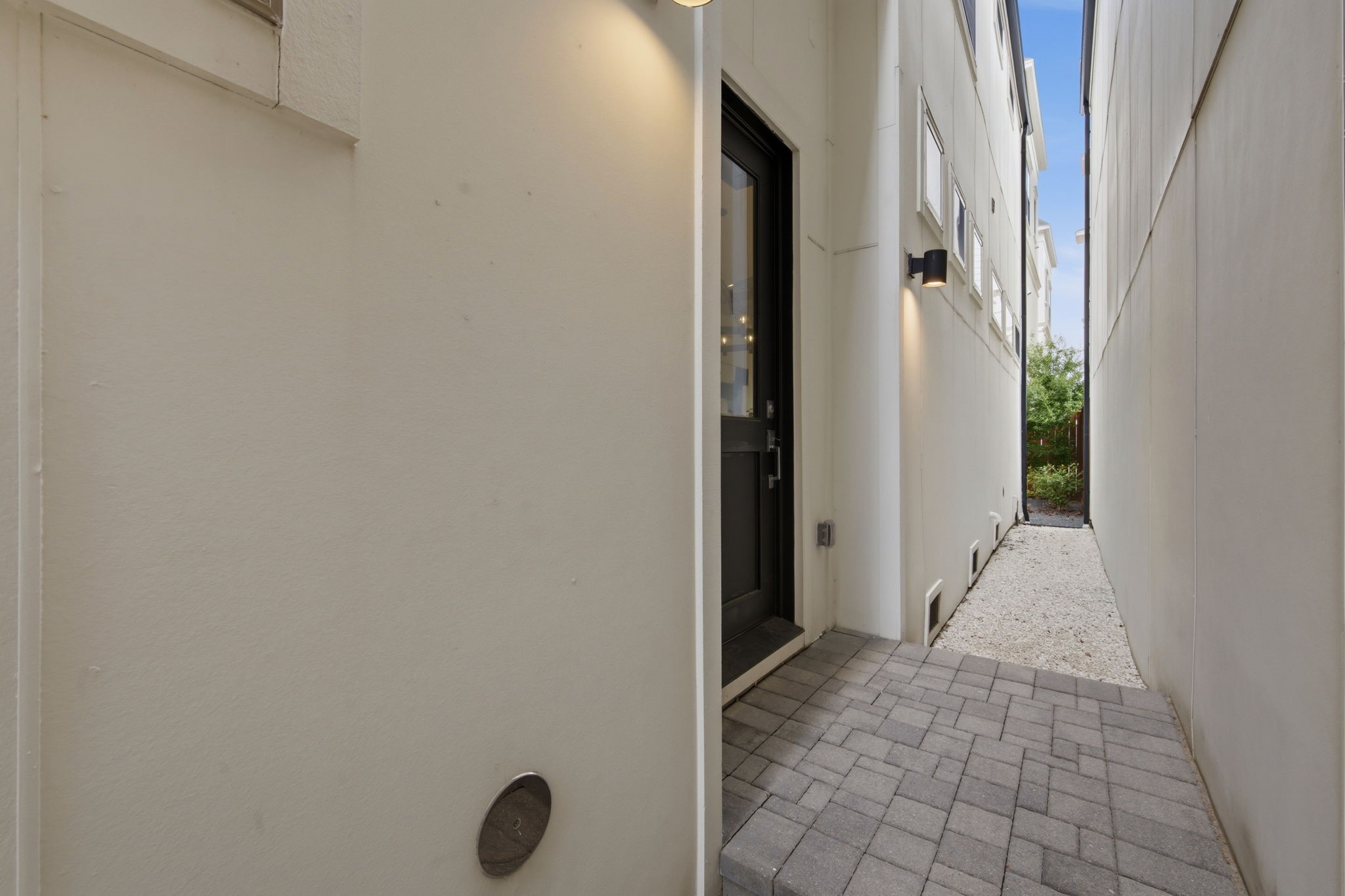 1906 West 25th Street Houston, TX 77008 - Photo 41 of 47 Front door is on side of home, behind a locked gate