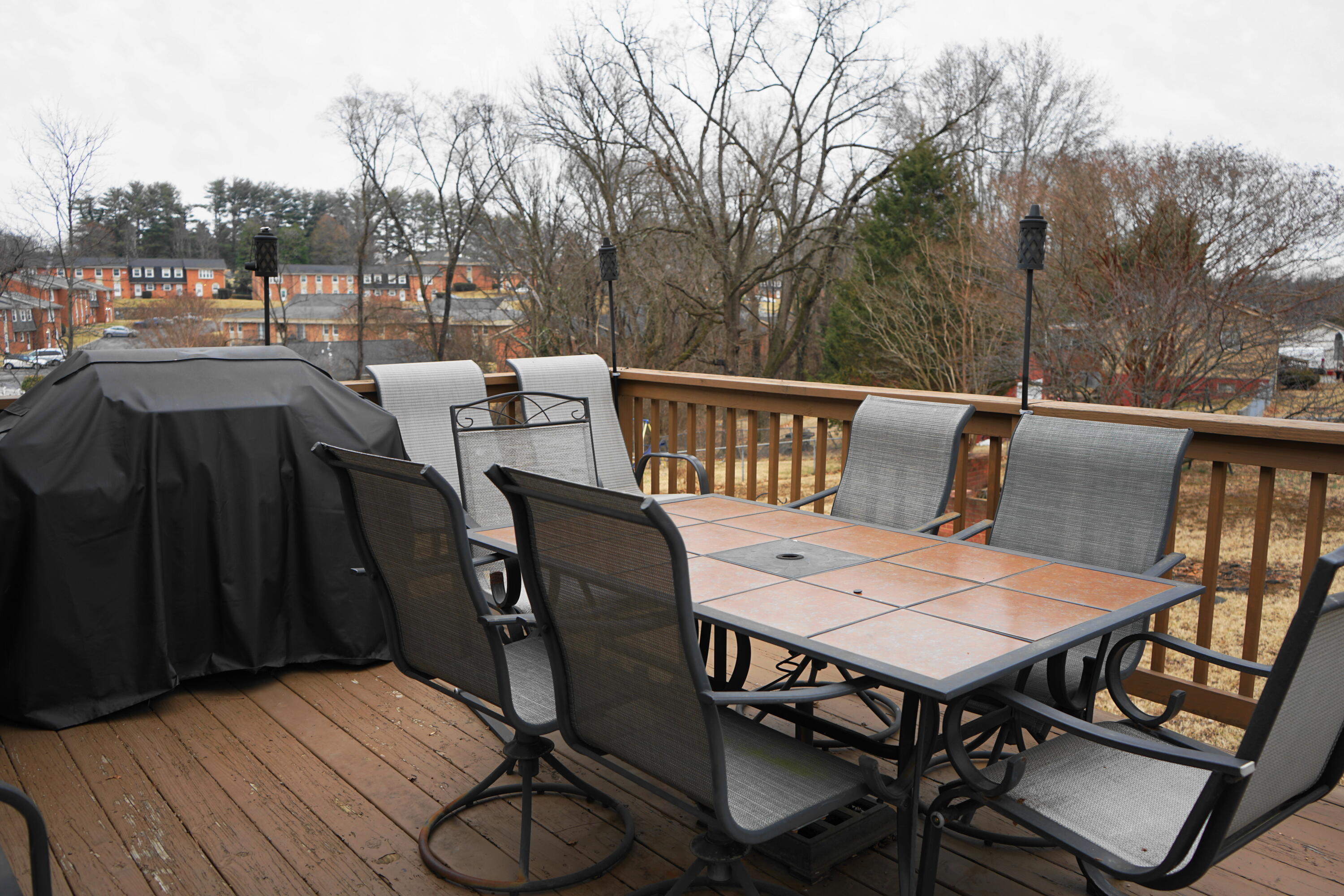 5320 Cove Road Roanoke, VA 24017 - Photo 12 of 30 a view of a dinning table and chairs on the roof deck