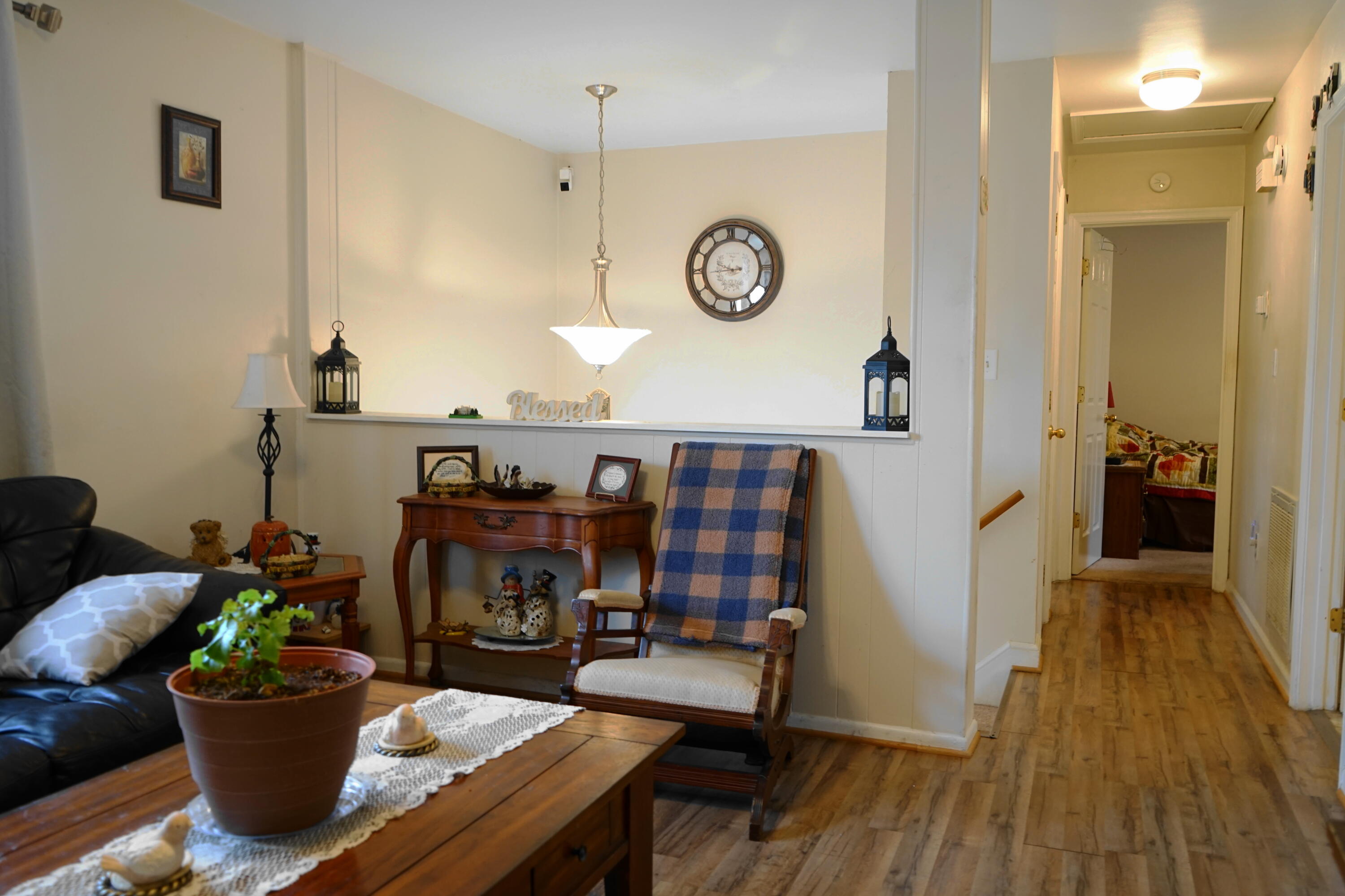 5320 Cove Road Roanoke, VA 24017 - Photo 15 of 30 a living room with furniture and wooden floor
