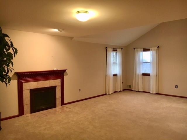 1245 Flatwoods Road Vanderbilt, PA 15486 - Photo 15 of 25 Master Bedroom Suite with Fireplace showcasing the partially vaulted ceiling.