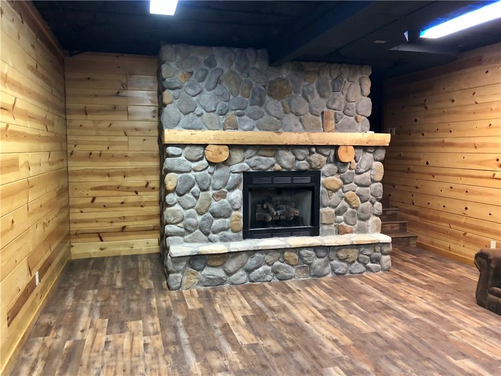 1245 Flatwoods Road Vanderbilt, PA 15486 - Photo 20 of 25 Enjoy the exercise or media room with stone fireplace.