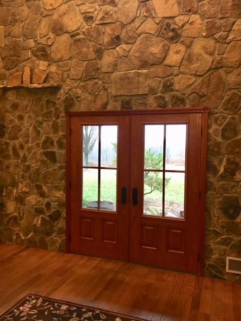 1245 Flatwoods Road Vanderbilt, PA 15486 - Photo 3 of 25 Stonework and Hardwood Floors compliment this Foyer.