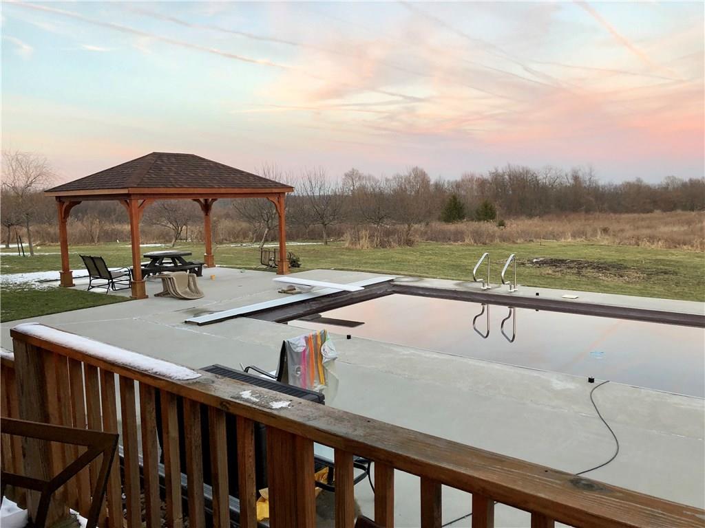 1245 Flatwoods Road Vanderbilt, PA 15486 - Photo 23 of 25 Lovely built-in pool with shaded Gazebo overlooking the hillsides.