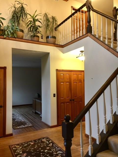 1245 Flatwoods Road Vanderbilt, PA 15486 - Photo 4 of 25 Staircase to Upper Foyer and Bedrooms Featuring Ledge for Displays.
