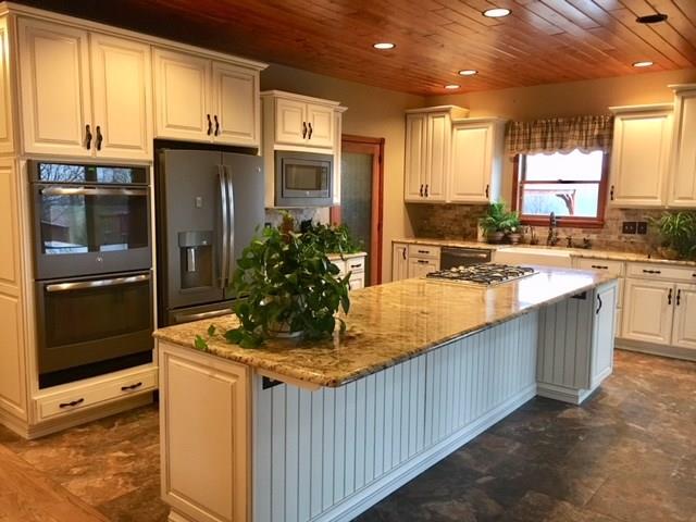 1245 Flatwoods Road Vanderbilt, PA 15486 - Photo 9 of 25 Brand New Updated Kitchen with Granite Countertops, Tile Floor, SS Appliances and Lighted Pantry.