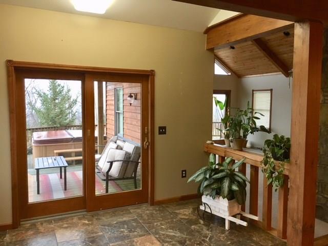1245 Flatwoods Road Vanderbilt, PA 15486 - Photo 10 of 25 A Breakfast Nook off the Kitchen that opens to the Deck outside with Covered Pergola.