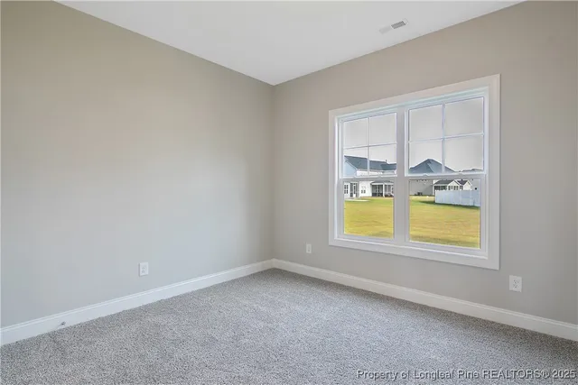 an empty room with window