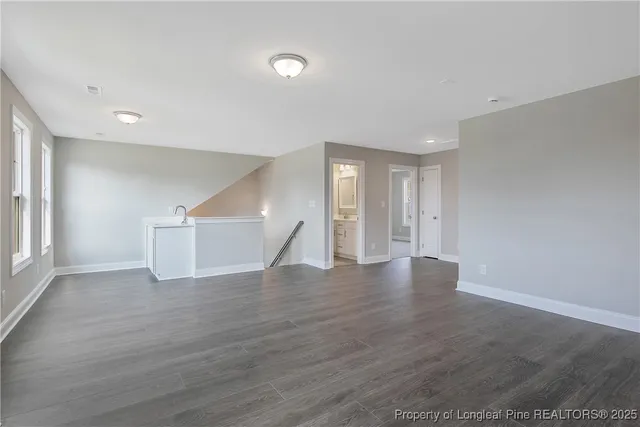a view of a kitchen with a sink and dishwasher