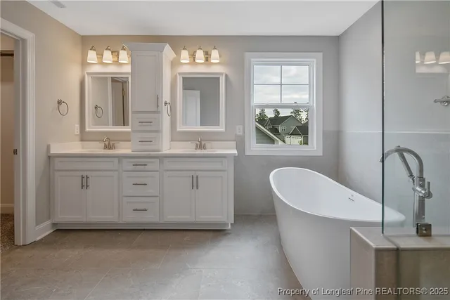 a bathroom with a bathtub and a sink