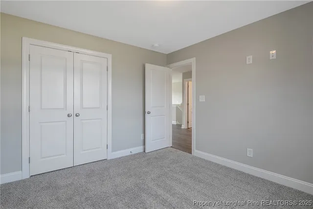 a view of an entryway with a livingroom