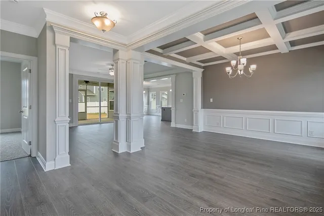 wooden floor in a hall with an entryway of the house
