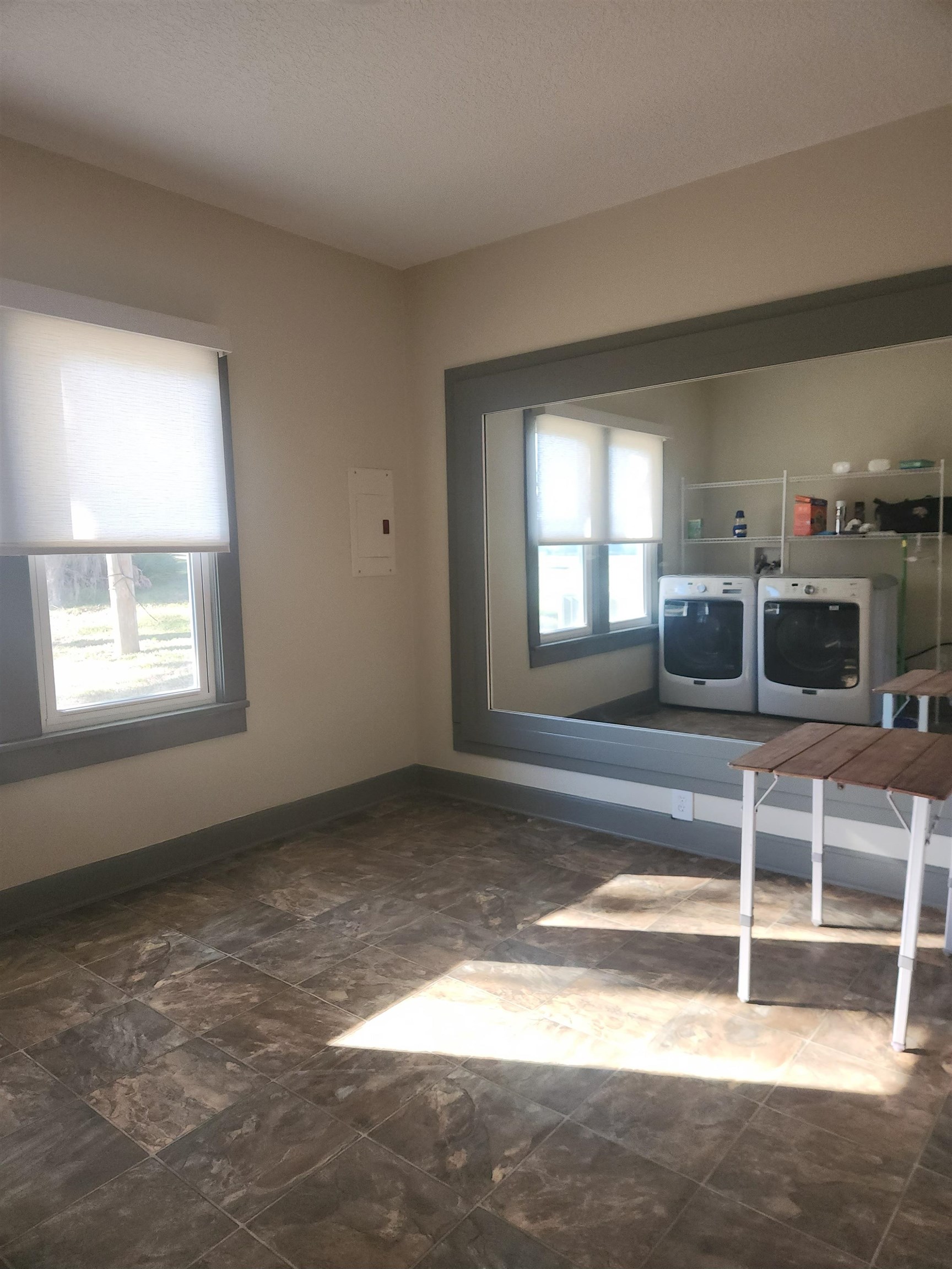 250 Brainard Drive, Unit A St. Augustine, FL 32086 - Photo 13 of 13 a living room with a fireplace and a window