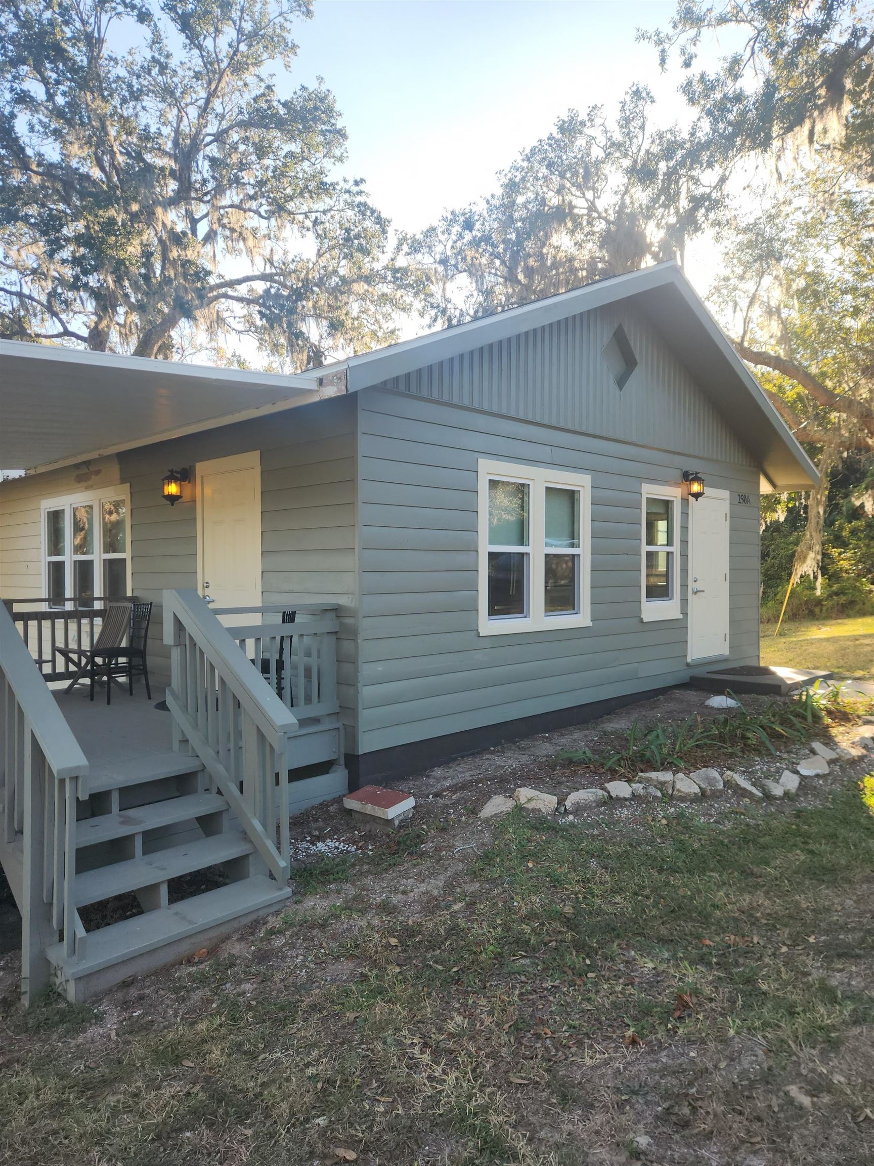 250 Brainard Drive, Unit A St. Augustine, FL 32086 - Photo 3 of 13 a view of a house with a yard