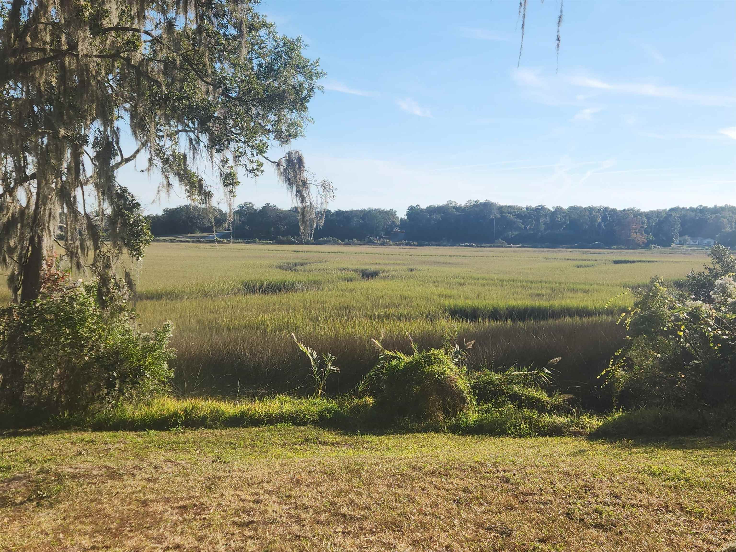 250 Brainard Drive, Unit A St. Augustine, FL 32086 - Photo 6 of 13 a view of a lake with a lake