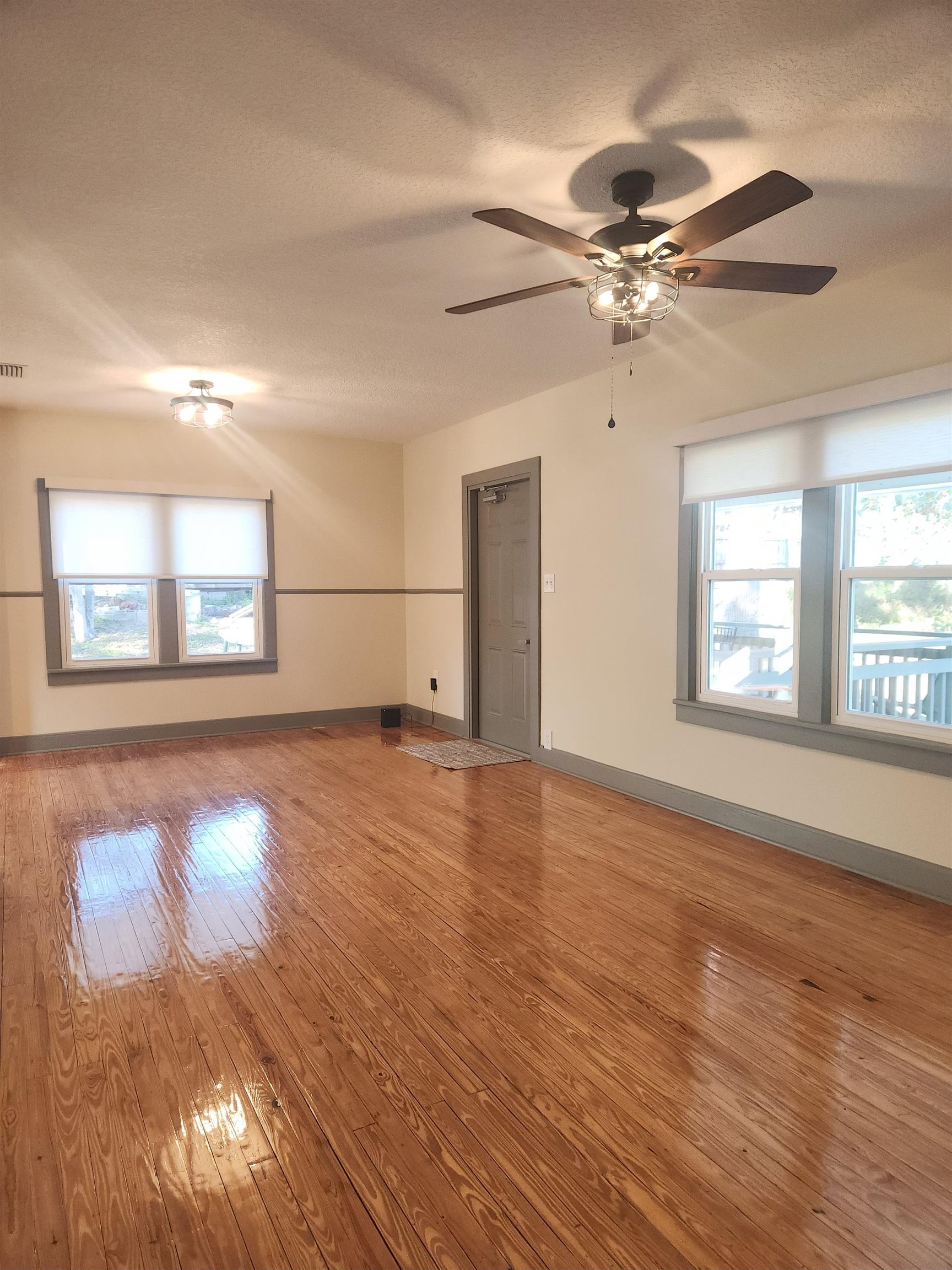 250 Brainard Drive, Unit A St. Augustine, FL 32086 - Photo 9 of 13 a view of empty room with wooden floor and fan