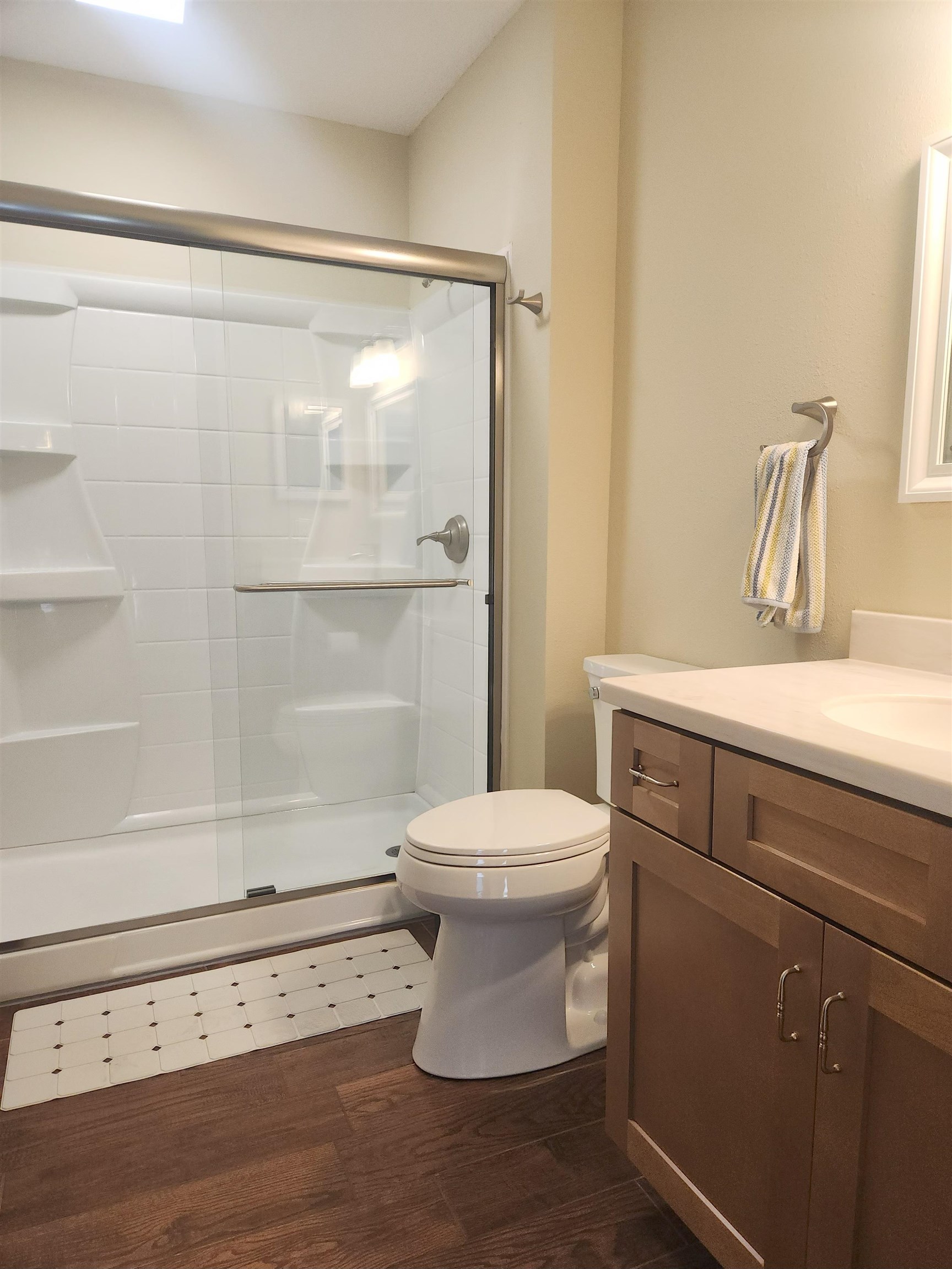 250 Brainard Drive, Unit A St. Augustine, FL 32086 - Photo 10 of 13 a bathroom with a sink a toilet and shower