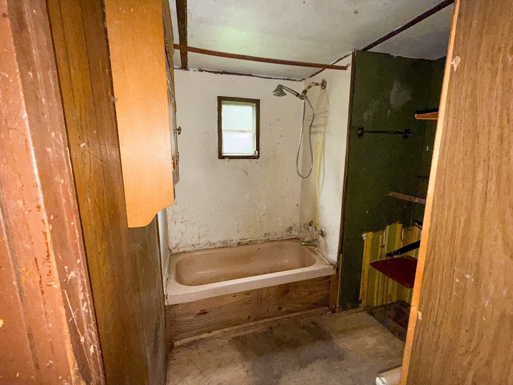 594 Route 8A Heath, MA 01340 - Photo 11 of 14 a bathroom with a tub and a shower