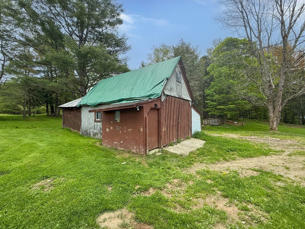 594 Route 8A Heath, MA 01340 - Photo 4 of 14 a view of a house with a yard
