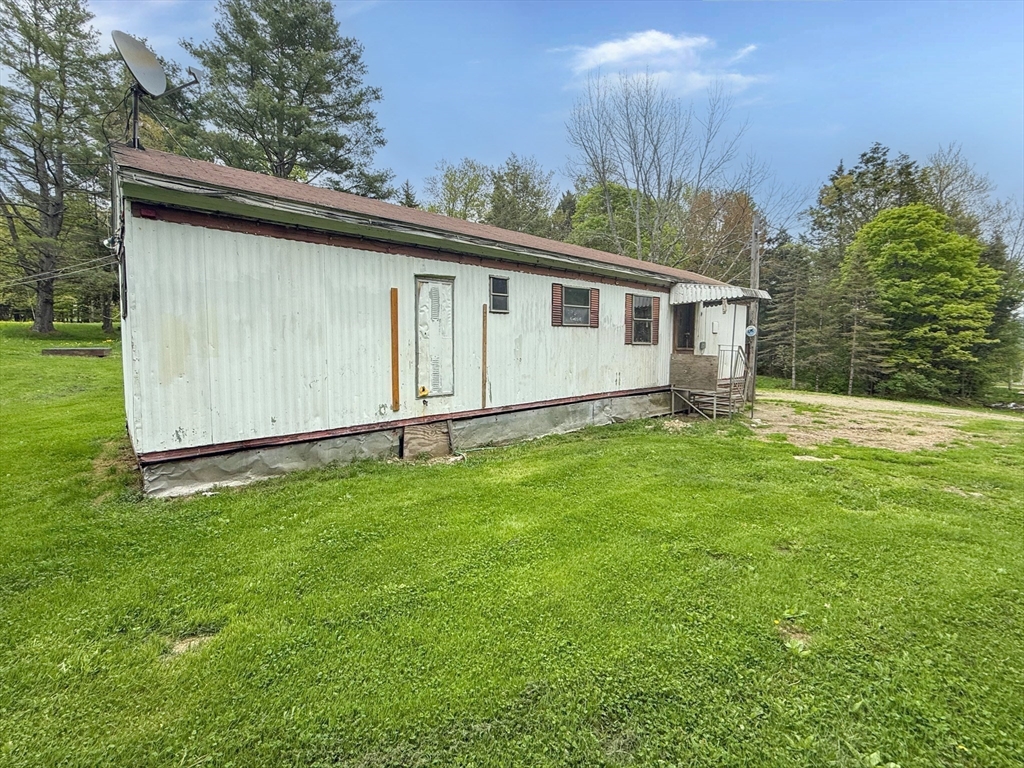 594 Route 8A Heath, MA 01340 - Photo 5 of 14 a backyard of a house with lots of green space