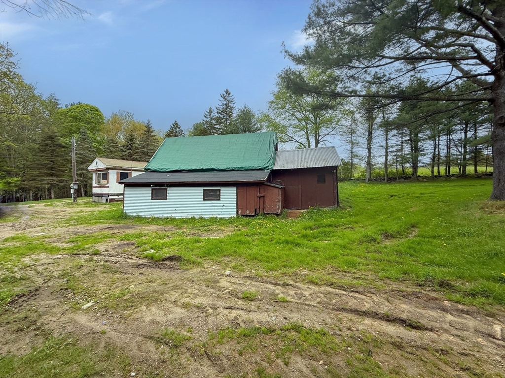 594 Route 8A Heath, MA 01340 - Photo 7 of 14 a view of a house with a yard