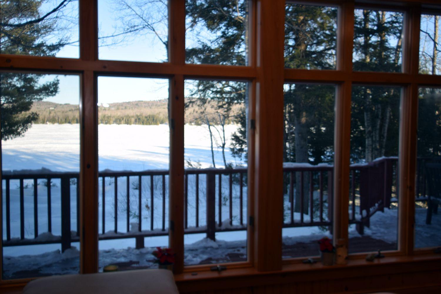 24 Timber Lane Embden, ME 04958 - Photo 11 of 47 looking out from great room