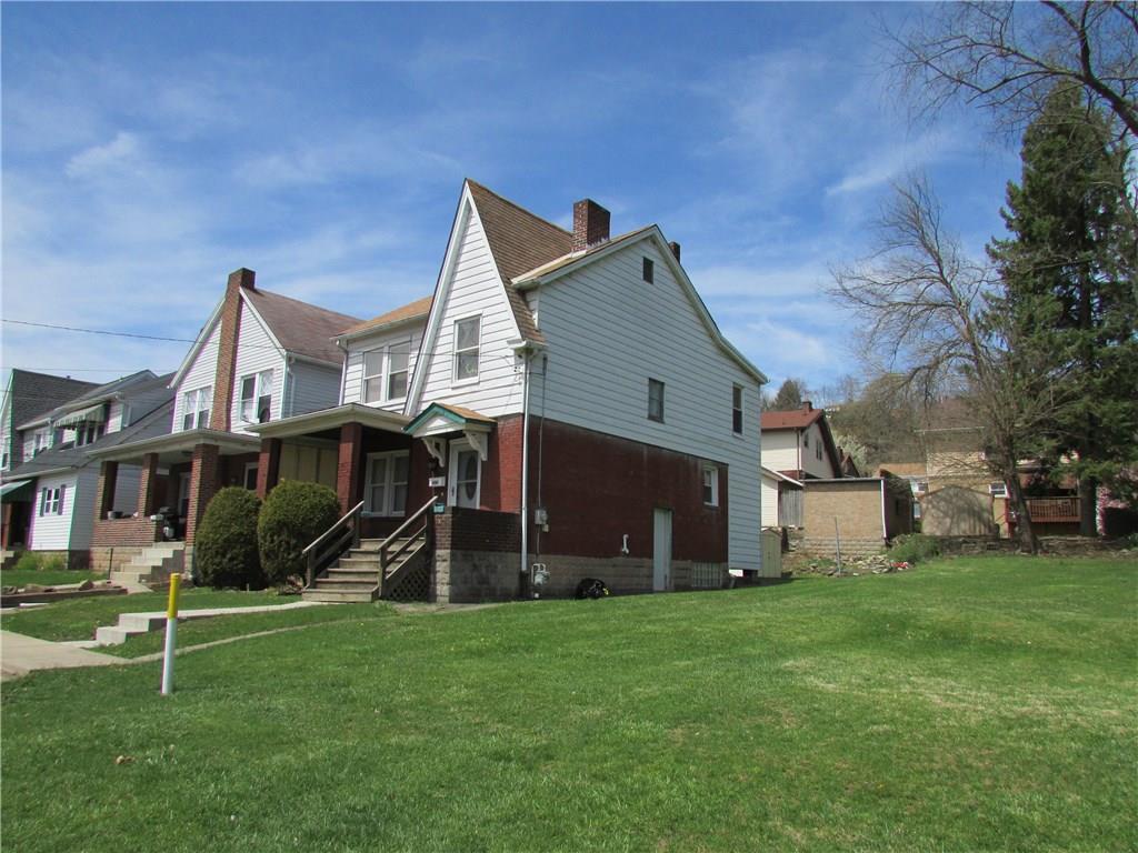 950 Stanford Road Pittsburgh, PA 15212 - Photo 3 of 25 Four bedroom home for sale. Includes vacant lot. Great Yard!!