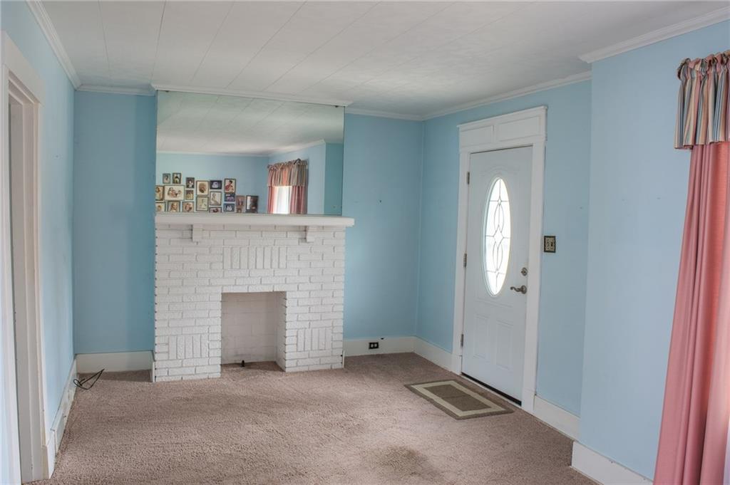 950 Stanford Road Pittsburgh, PA 15212 - Photo 10 of 25 Decorative fireplace in living room