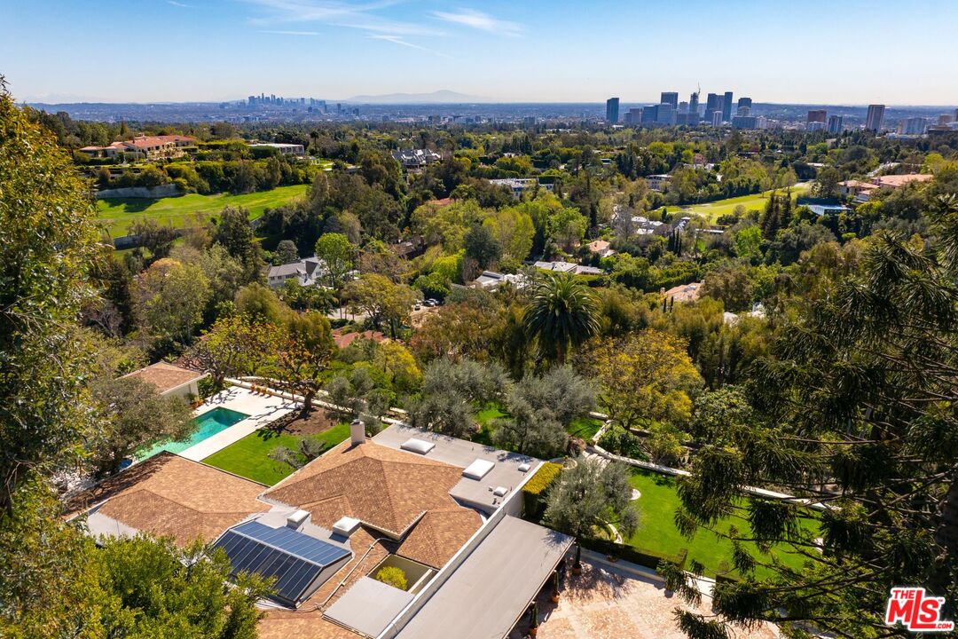 750 Lausanne Road Los Angeles, CA 90077 - Photo 4 of 16 an aerial view of residential houses with outdoor space