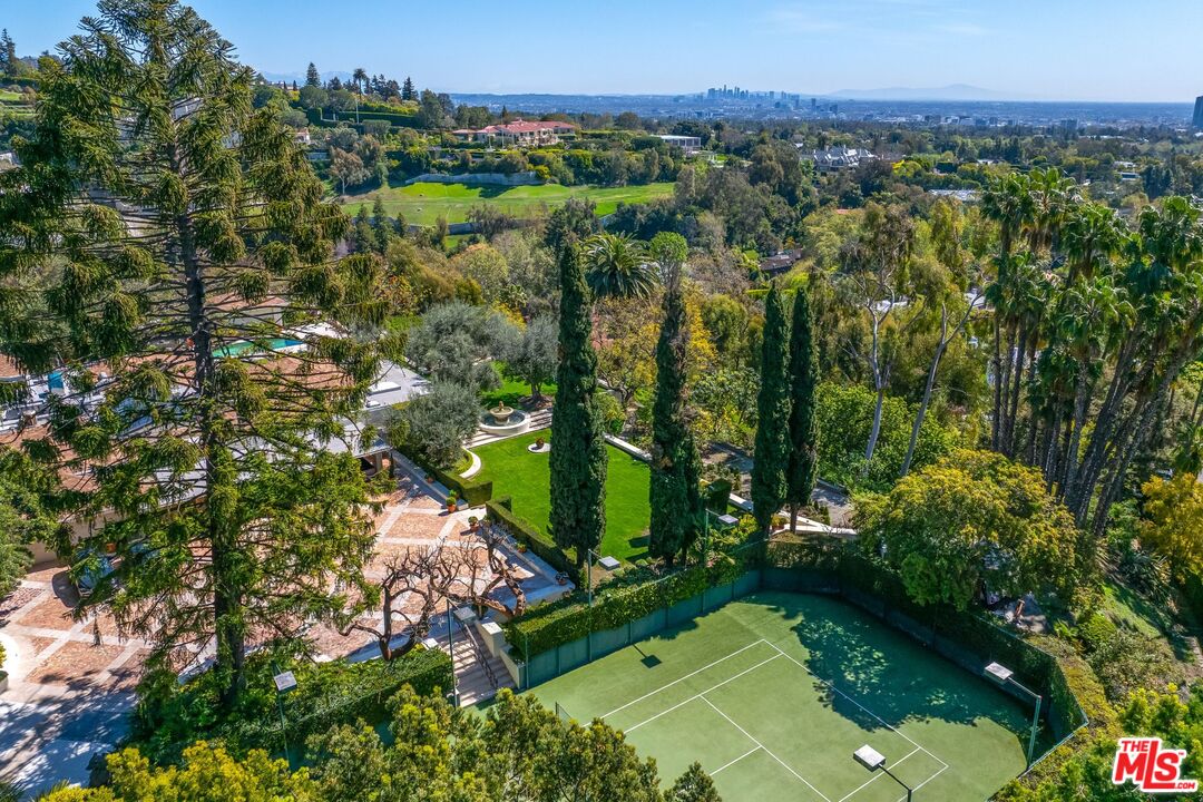 750 Lausanne Road Los Angeles, CA 90077 - Photo 8 of 16 a view of a city with lush green forest