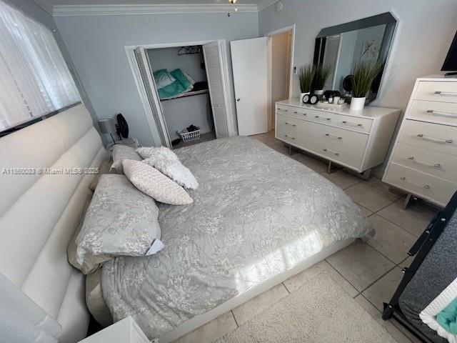 350 75th Street, Unit 202 Miami Beach, FL 33141 - Photo 15 of 21 a living room with furniture and a flat screen tv