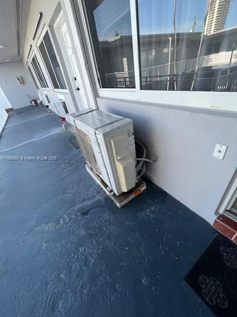 350 75th Street, Unit 202 Miami Beach, FL 33141 - Photo 19 of 21 a view of an empty room with a window