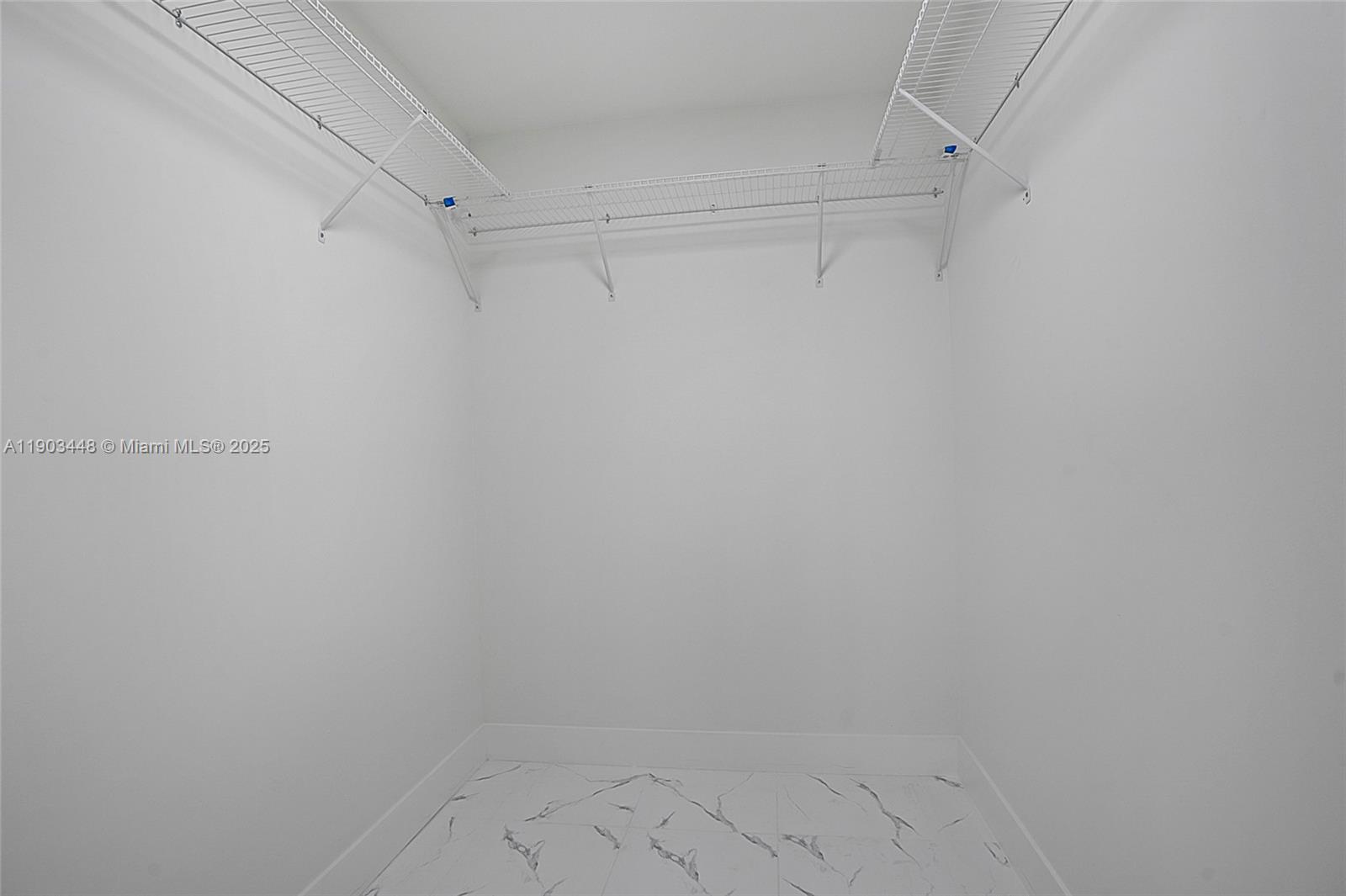 10362 Southwest 180th Street, Unit 3 Miami, FL 33157 - Photo 11 of 17 a view of an empty walk in closet