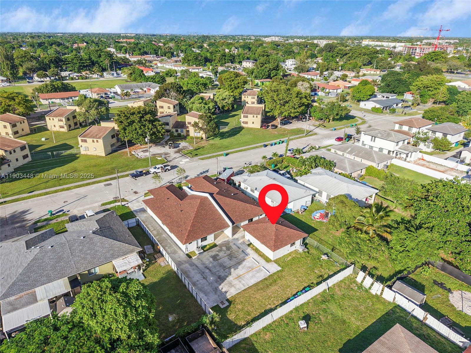 10362 Southwest 180th Street, Unit 3 Miami, FL 33157 - Photo 13 of 17 an aerial view of a city