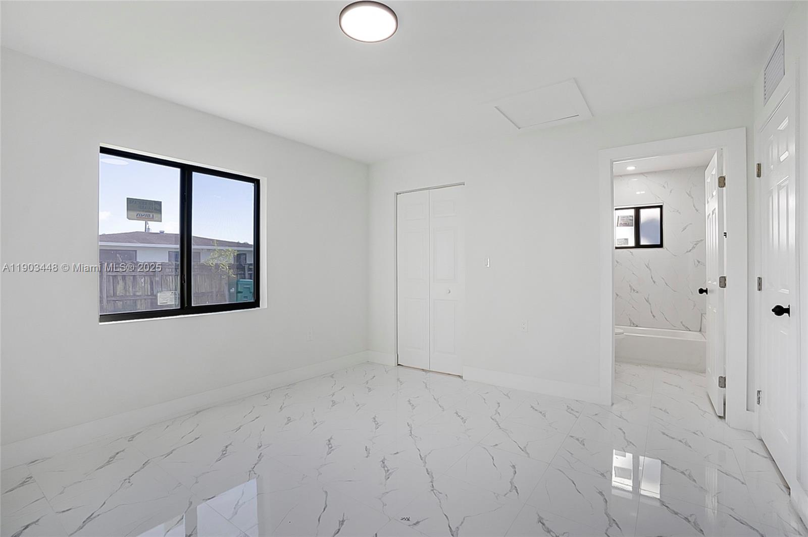 10362 Southwest 180th Street, Unit 3 Miami, FL 33157 - Photo 9 of 17 a view of an empty room