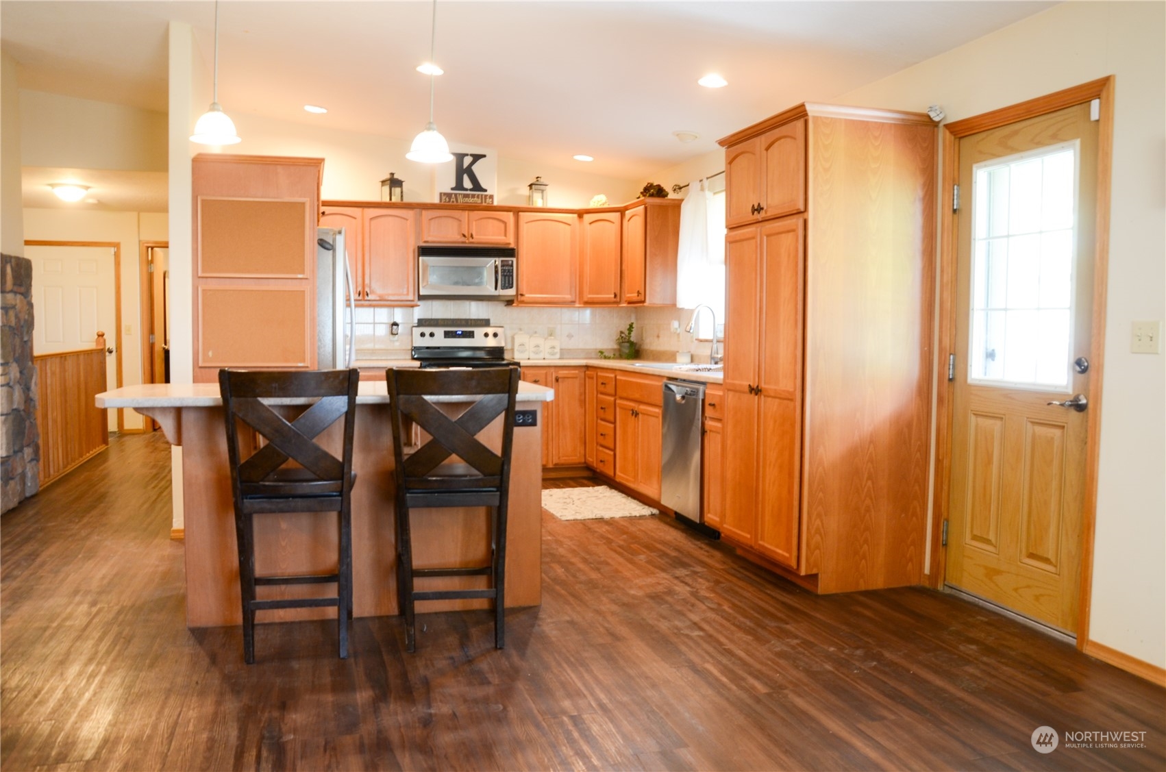 1241 North Sage Road Ritzville, WA 99169 - Photo 14 of 40 a view of a dining room with furniture and wooden floor