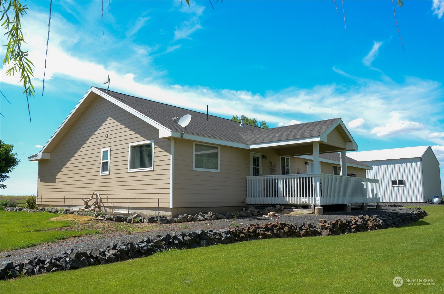 1241 North Sage Road Ritzville, WA 99169 - Photo 38 of 40 a front view of a house with a garden