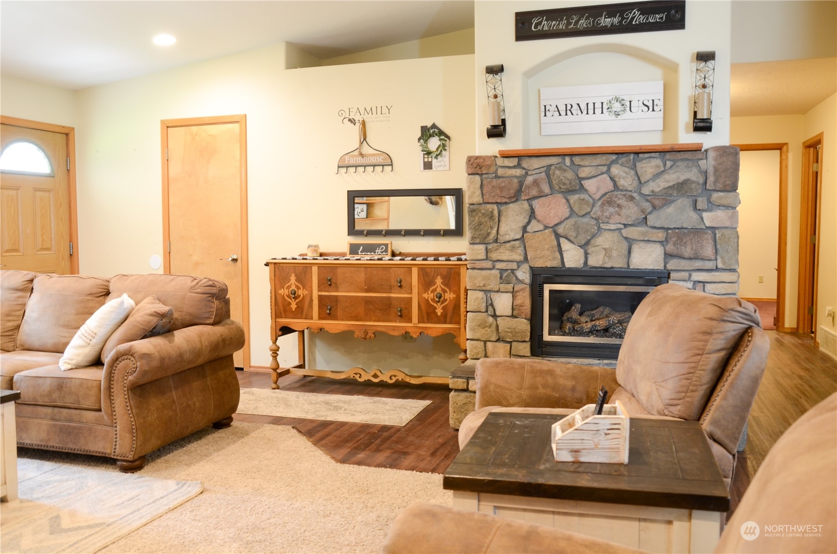 1241 North Sage Road Ritzville, WA 99169 - Photo 9 of 40 a living room with furniture and a fireplace