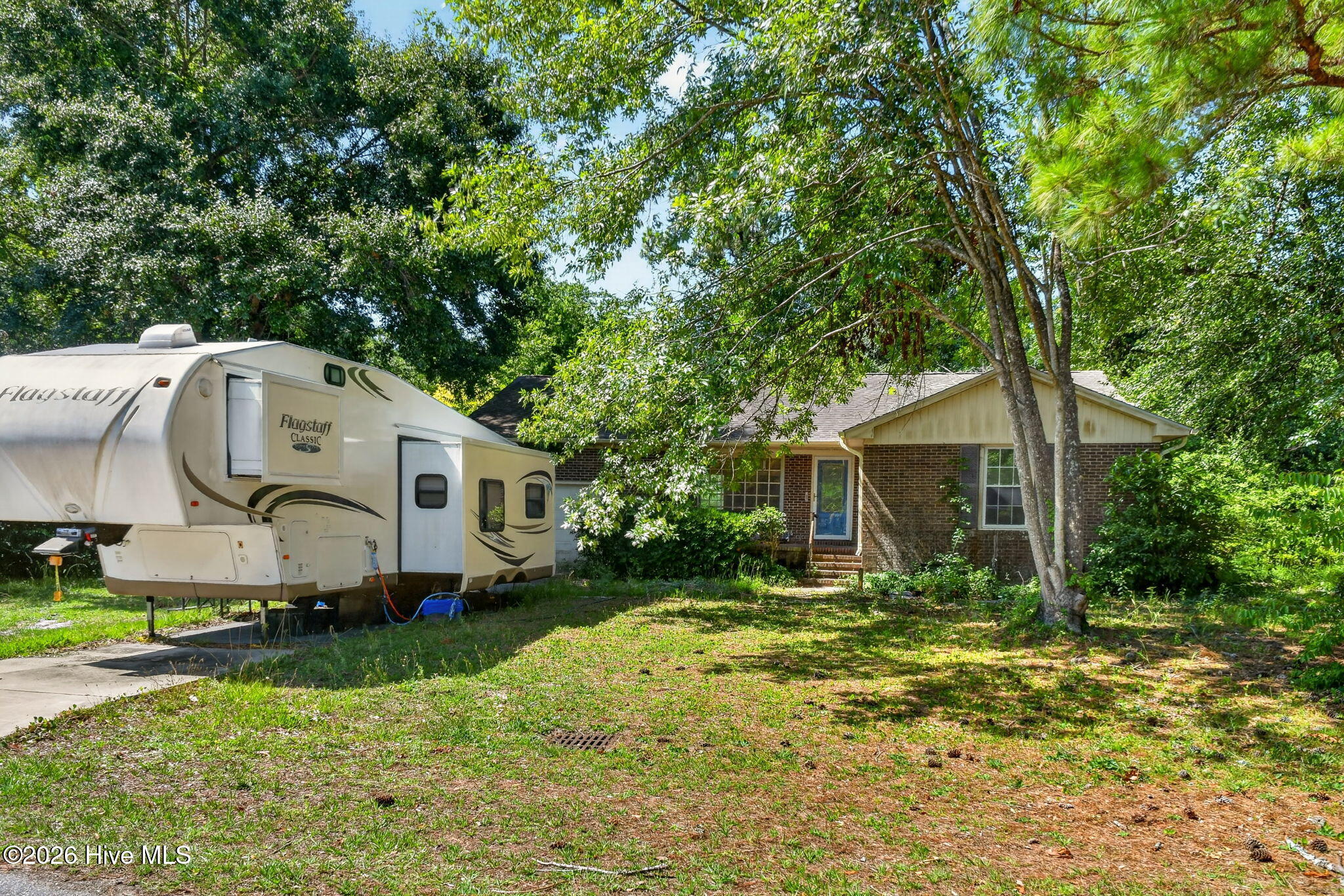 18 Pelican Point Road Wilmington, NC 28409 - Photo 29 of 36 Home from the Road with the travel trailer