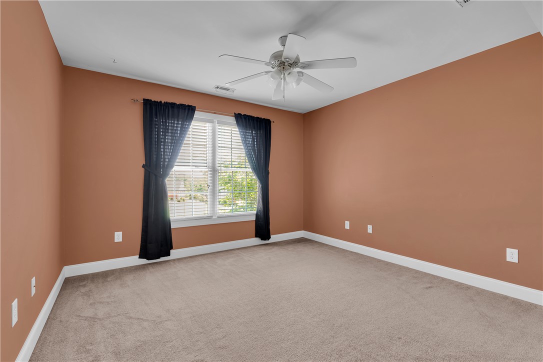 406 Hopewell Ridge Anderson, SC 29621 - Photo 29 of 46 This spacious bedroom offers ample natural light and a comfortable atmosphere for relaxation.