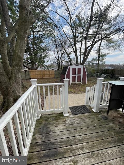 48 Fleming Street Newark, DE 19713 - Photo 16 of 16 a view of a chair and table on the wooden floor