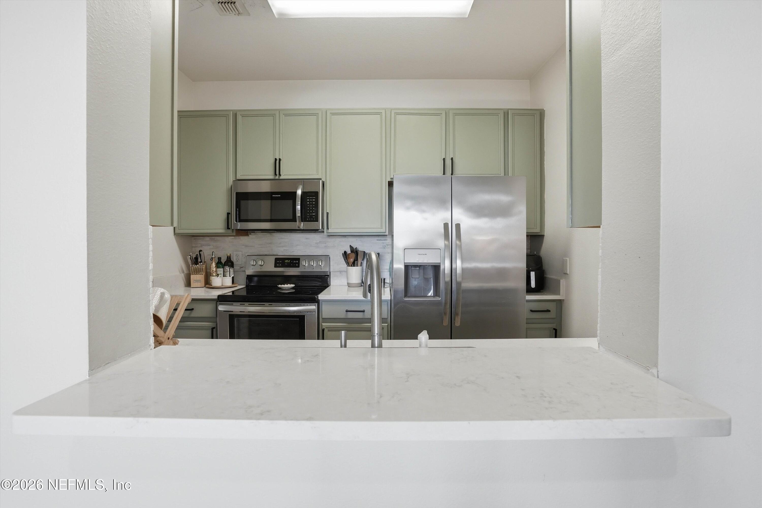 7990 Baymeadows Road, Unit 727 Jacksonville, FL 32256 - Photo 17 of 28 08-Kitchen