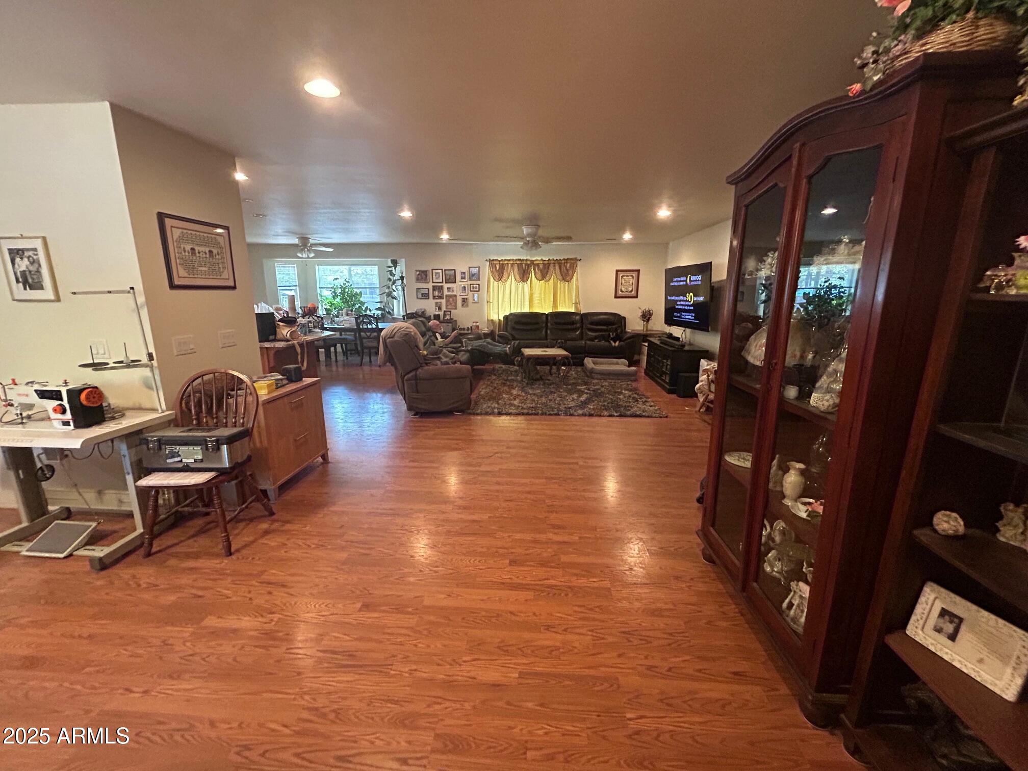 5107 Forest View Road Lakeside, AZ 85929 - Photo 15 of 24 a living room with furniture and a flat screen tv