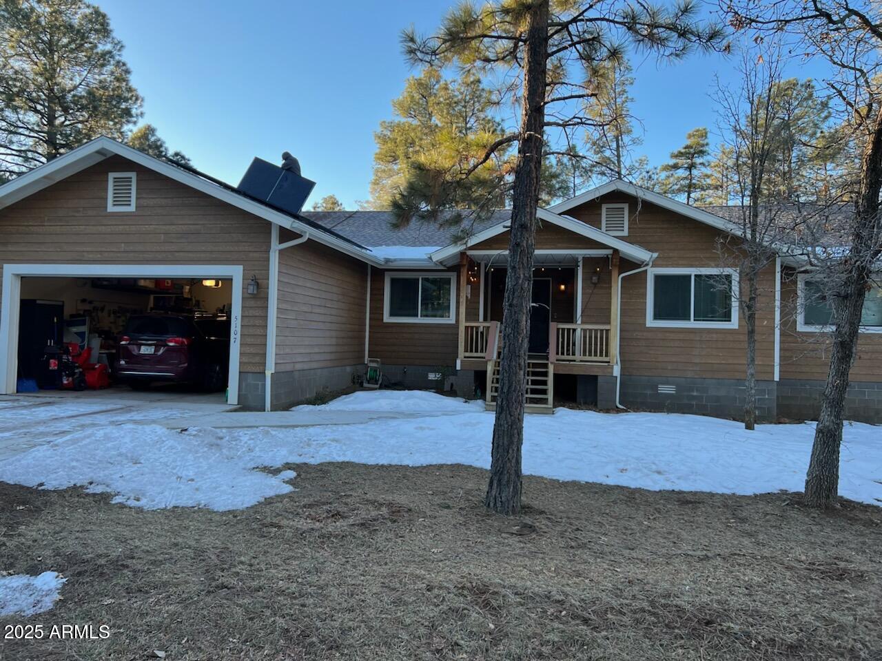 5107 Forest View Road Lakeside, AZ 85929 - Photo 24 of 24 a view of a house with a yard