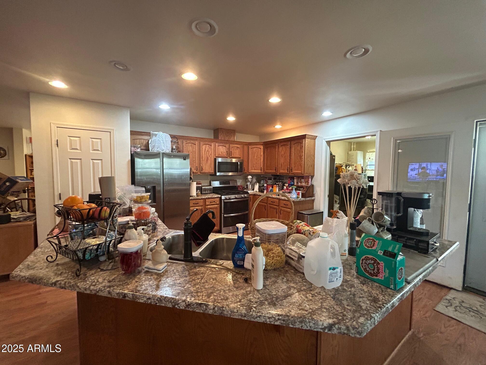 5107 Forest View Road Lakeside, AZ 85929 - Photo 4 of 24 a room with lots of chairs and mirrors