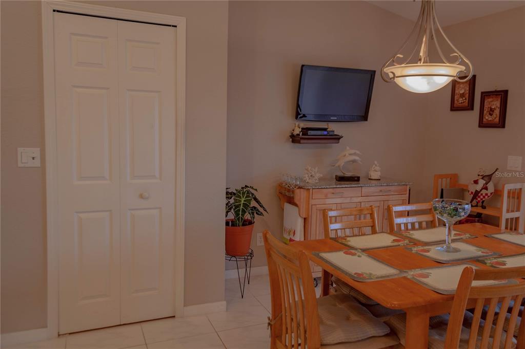 11241 Cocoa Beach Drive Riverview, FL 33569 - Photo 13 of 36 a view of a dining room with furniture