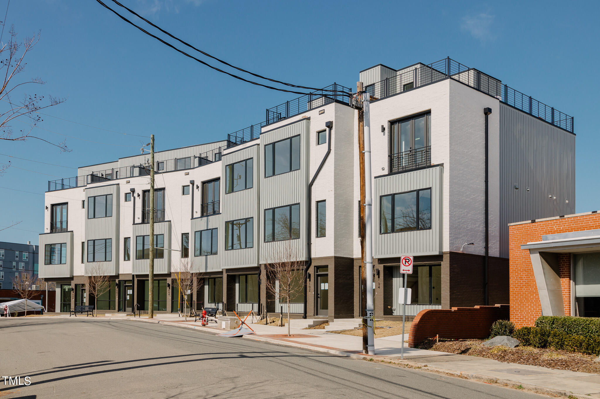 a view of a building with a street