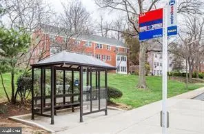 a view of a brick building with a yard